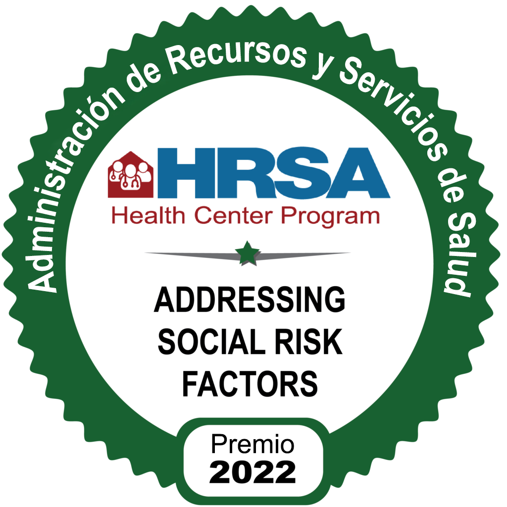 Insignia de HRSA por Abordar Factores de Riesgo Sociales